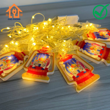 Dây đèn chớp led rèm thả hình cây đèn dầu và lâu đài